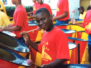 Picture af dreng på steelpans på St. Croix